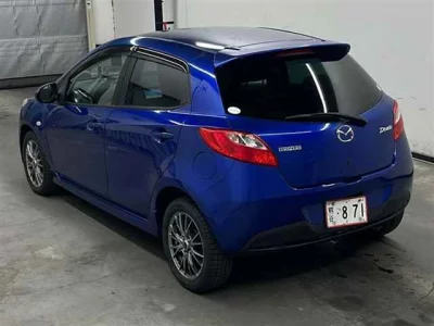 Mazda DEMIO  с аукциона в Японии