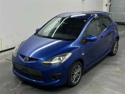 Mazda DEMIO  с аукциона в Японии