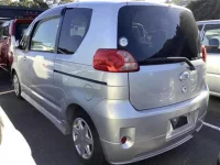 Toyota PORTE лот № 2037 оценка   с аукциона в Японии 1