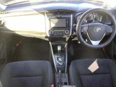 Toyota COROLLA FIELDER  с аукциона в Японии