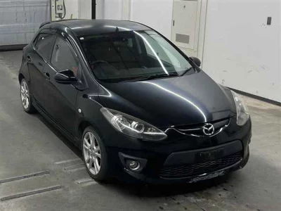 Mazda DEMIO  с аукциона в Японии