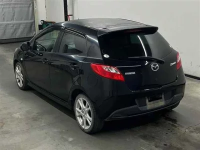 Mazda DEMIO  с аукциона в Японии
