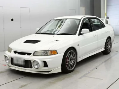 Mitsubishi LANCER  с аукциона в Японии