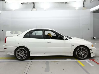 Mitsubishi LANCER  с аукциона в Японии