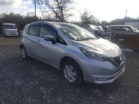 Nissan NOTE лот № 23618 оценка 4  с аукциона в Японии 1