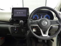 Nissan SAKURA лот № 1309 оценка 5  с аукциона в Японии 4