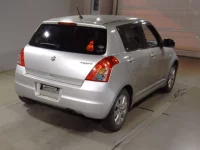 Suzuki SWIFT лот № 7017 оценка R  с аукциона в Японии 1