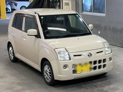 Nissan PINO  с аукциона в Японии