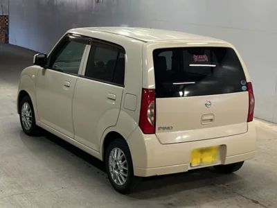 Nissan PINO  с аукциона в Японии