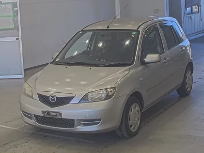 Mazda DEMIO  с аукциона в Японии