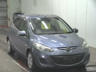 Mazda DEMIO  с аукциона в Японии