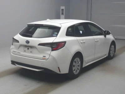 Toyota COROLLA TOURING  с аукциона в Японии