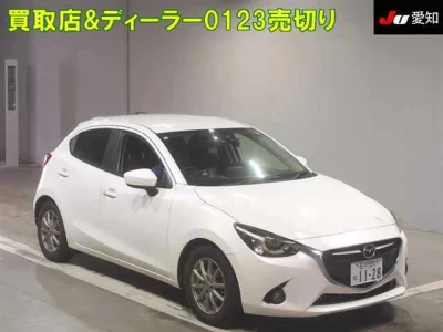 Mazda DEMIO  с аукциона в Японии