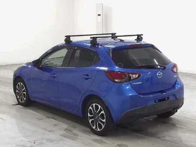 Mazda DEMIO  с аукциона в Японии