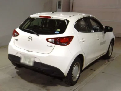 Mazda DEMIO  с аукциона в Японии