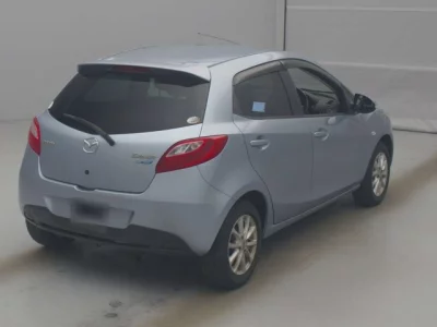 Mazda DEMIO  с аукциона в Японии