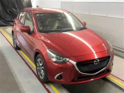 Mazda DEMIO  с аукциона в Японии