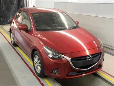 Mazda DEMIO  с аукциона в Японии