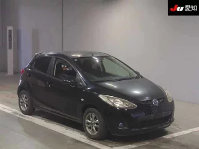 Mazda DEMIO  с аукциона в Японии