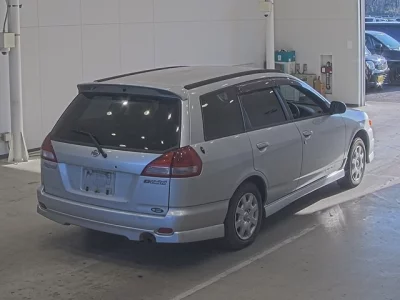 Nissan WINGROAD  с аукциона в Японии