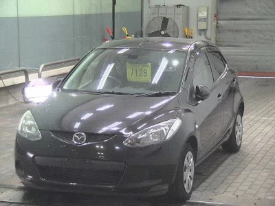 Mazda DEMIO  с аукциона в Японии