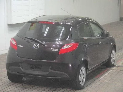 Mazda DEMIO  с аукциона в Японии