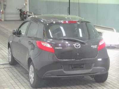 Mazda DEMIO  с аукциона в Японии