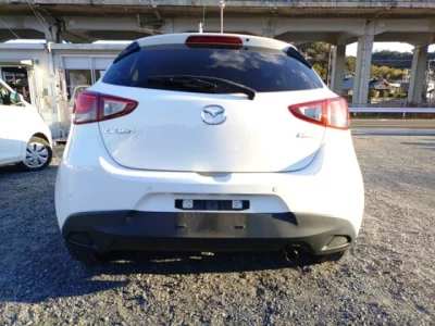 Mazda DEMIO  с аукциона в Японии