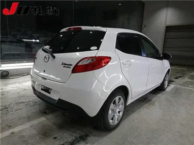 Mazda DEMIO  с аукциона в Японии