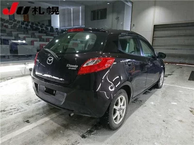 Mazda DEMIO  с аукциона в Японии
