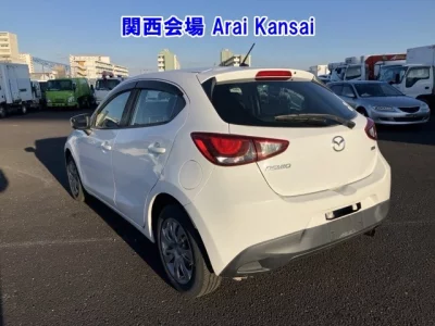 Mazda DEMIO  с аукциона в Японии
