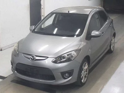 Mazda DEMIO  с аукциона в Японии