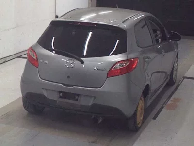 Mazda DEMIO  с аукциона в Японии