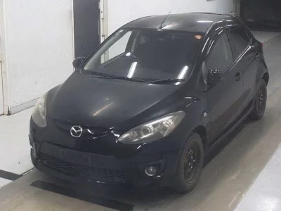Mazda DEMIO  с аукциона в Японии