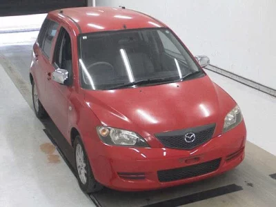 Mazda DEMIO  с аукциона в Японии