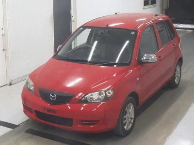Mazda DEMIO  с аукциона в Японии