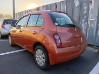 Nissan MARCH лот № 6718 оценка R  с аукциона в Японии 1