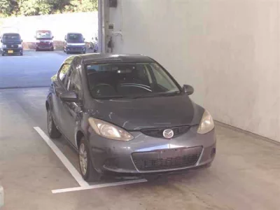 Mazda DEMIO  с аукциона в Японии