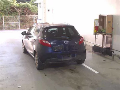 Mazda DEMIO  с аукциона в Японии