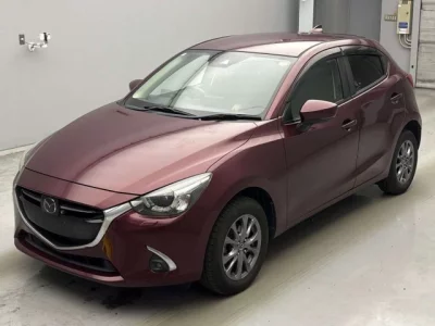 Mazda DEMIO  с аукциона в Японии