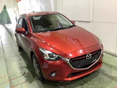 Mazda DEMIO  с аукциона в Японии