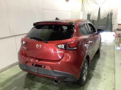 Mazda DEMIO  с аукциона в Японии