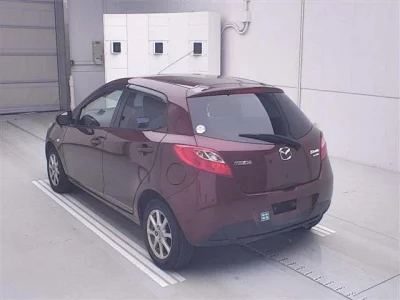 Mazda DEMIO  с аукциона в Японии