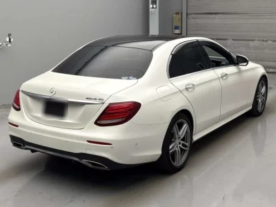 Mercedes-Benz E CLASS  с аукциона в Японии