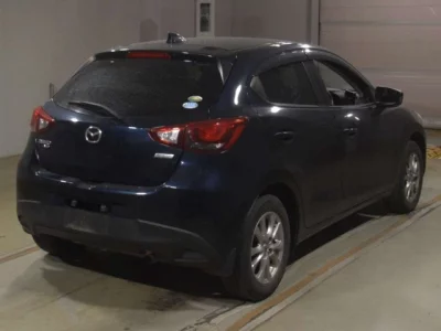 Mazda DEMIO  с аукциона в Японии