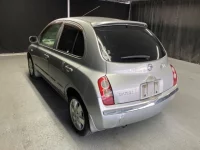 Nissan MARCH лот № 1063 оценка R  с аукциона в Японии 1