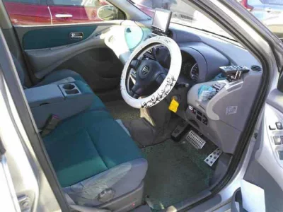 Nissan TINO  с аукциона в Японии