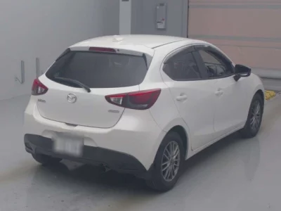 Mazda DEMIO  с аукциона в Японии