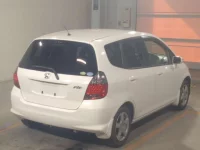 Honda FIT лот № 9041 оценка RA  с аукциона в Японии 1