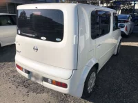 Nissan CUBECUBIC лот № 54020 оценка RA  с аукциона в Японии 1